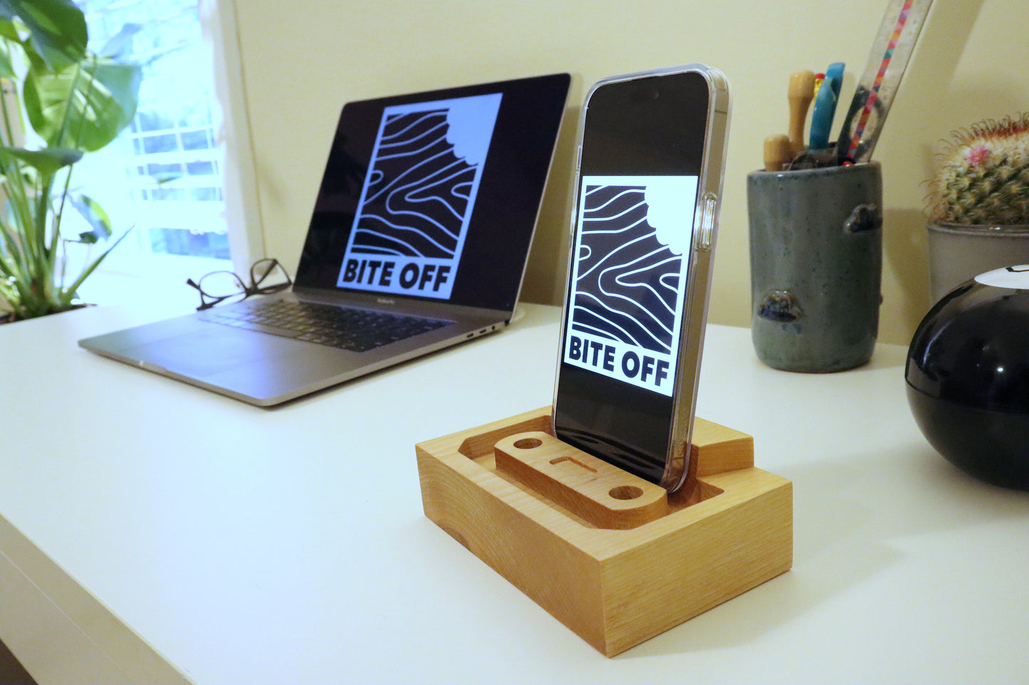 Bite Off Cassette Stand: Cell Phone Stand.